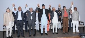Chairman of the interim election government, political party leaders and FNCCI president raising hands in a sign of solidarity to push for hydropower,
